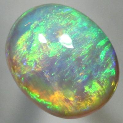 SOLID CRYSTAL OPAL High dome with very bright rolling flash, orange to green. SEE VIDEO